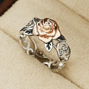 .925 Sterling silver ring/to gold rose